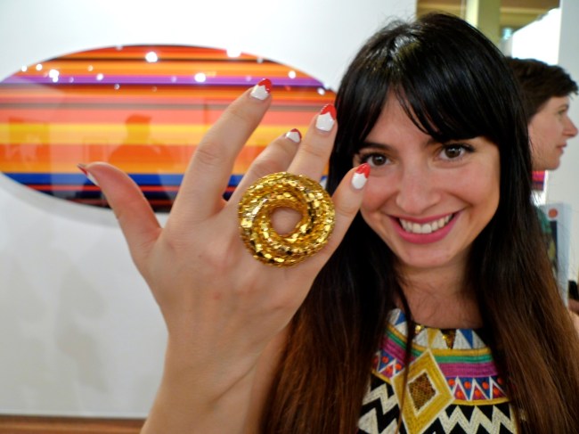 Elle Zoltak flashes her ring