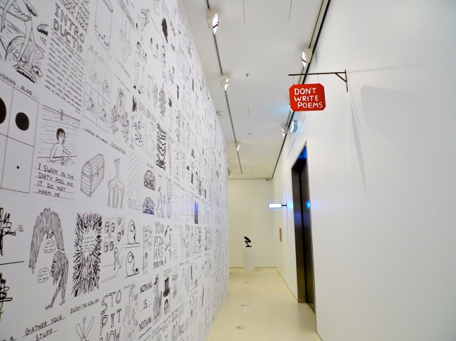 Don't write Poems signage