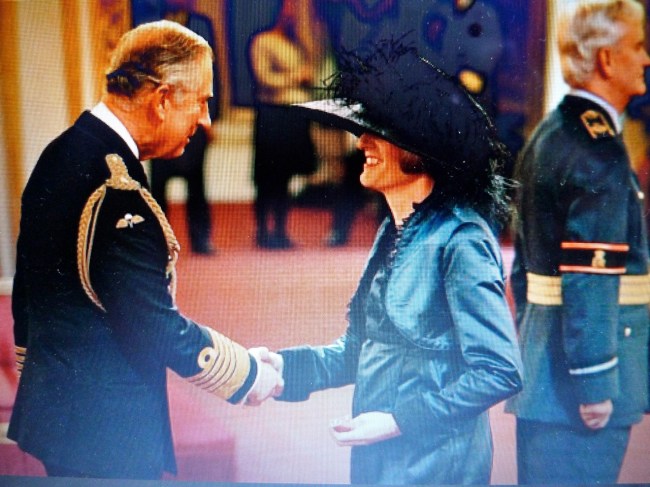 Prince Charles couldn't get the CBE Ribbon over Claire's hat