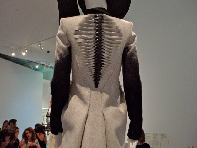 Eager shoppers check out the Dion Lee Arc coat dress