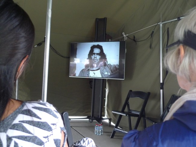 Watching Gary Foley in Darlene Johnson's documentary 'The Redfern Story' at Richard Bell's Aboriginal Embassy
