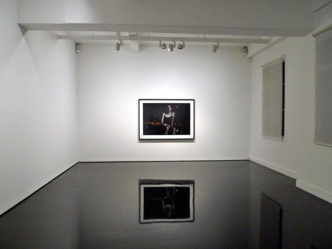 Another teenage girl, framed, hanging on the gallery wall