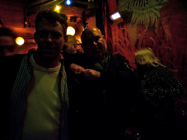 Nick and Boz and Tracey in Mood lighting, photo bombed by Mark